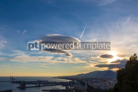 Nature: Large circular clouds (Altocumulus lenticularis duplicatus) in t #03090 Photo