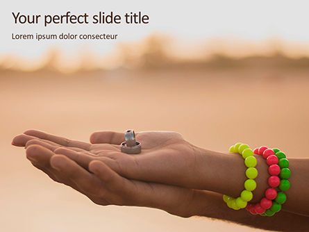 Wedding Bands on Person's Hand Presentation, Free PowerPoint Template, 16415, Holiday/Special Occasion — PoweredTemplate.com