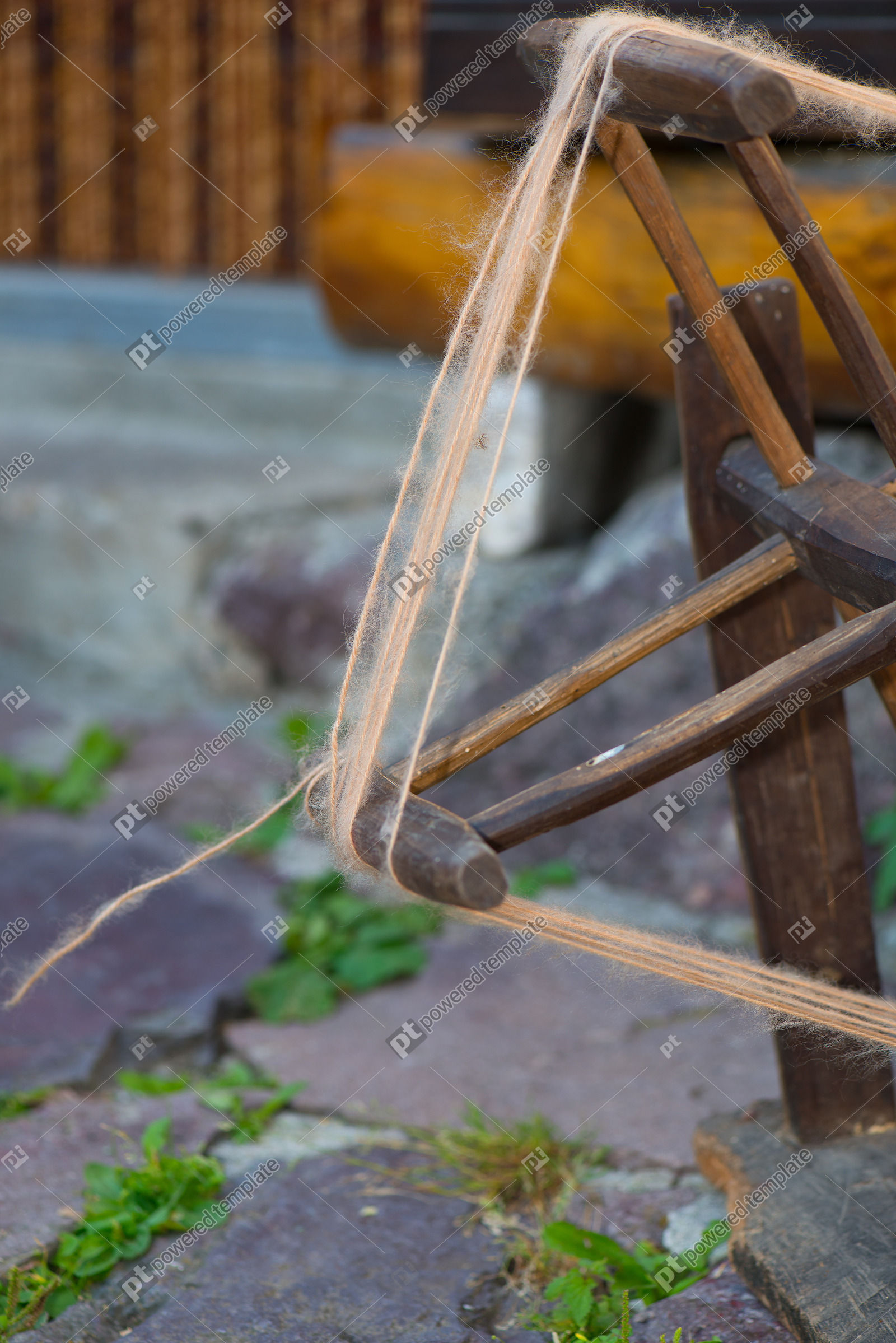 Old Woolen Spinner Tool at Work Outdoors Photo 101193
